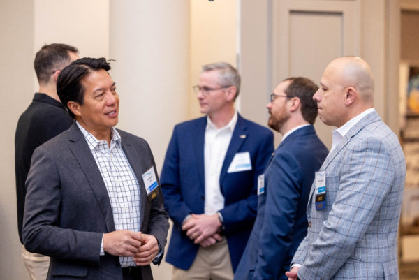 Attendees converse at the 2025 SWIFT Industry Day event.