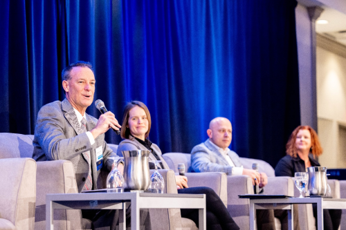 Attendees talk at the 2025 SWIFT Industry Day event in Newport News, Virginia